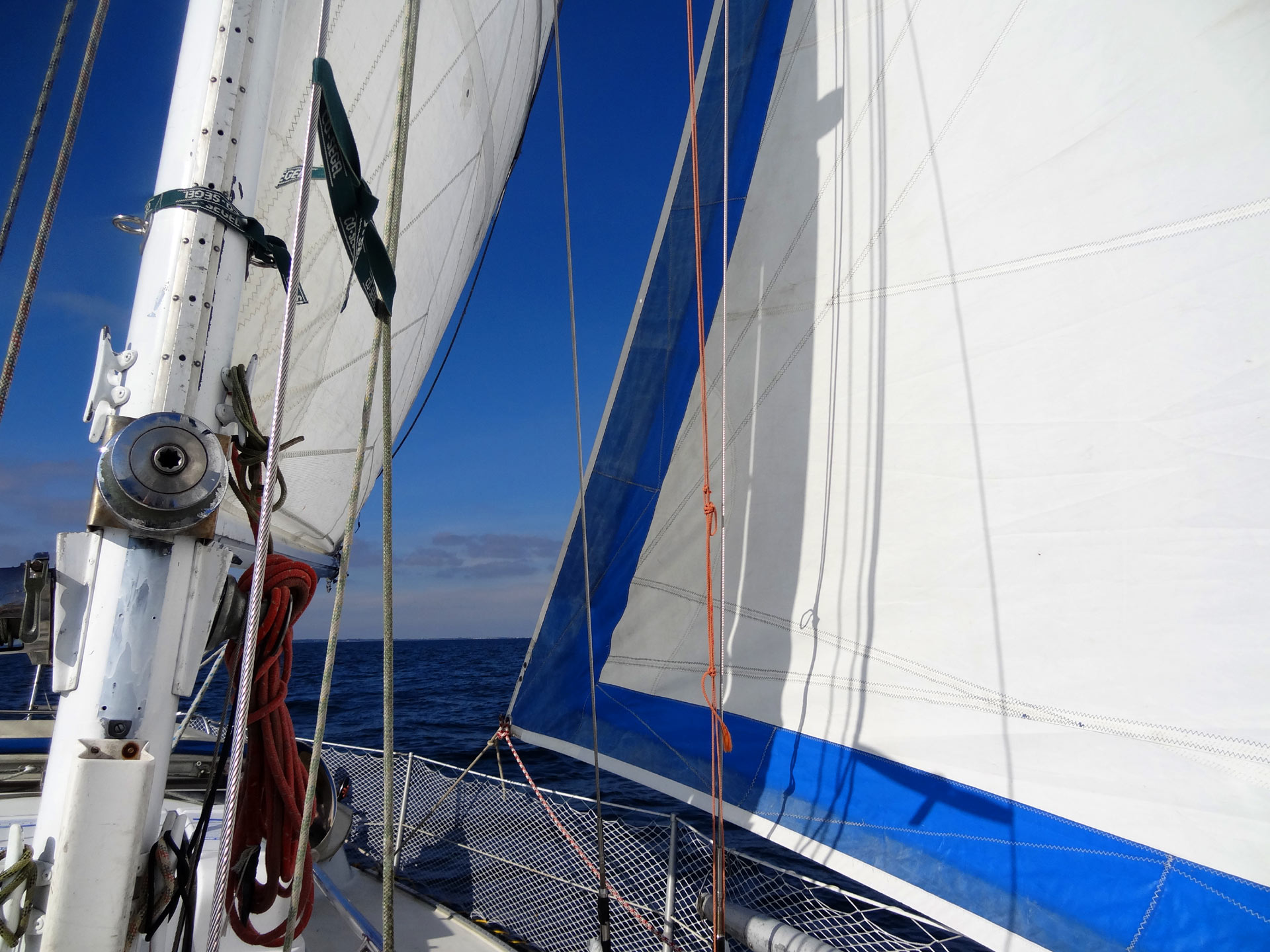 Mainsail and Genoa fly in light wind - still 5 knots over ground.