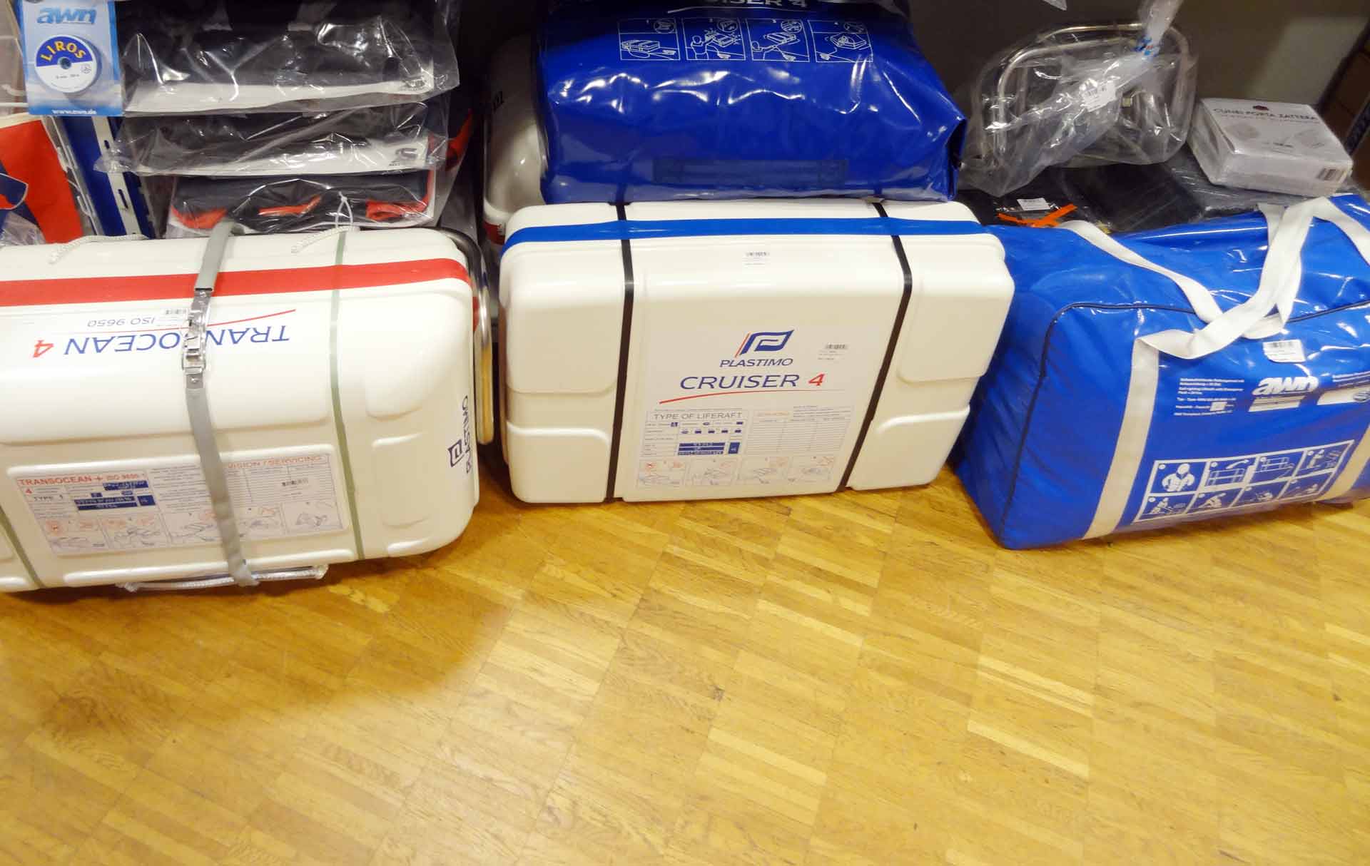 Life rafts: Solid boxes for storing outside or in lighter cases for storing under deck