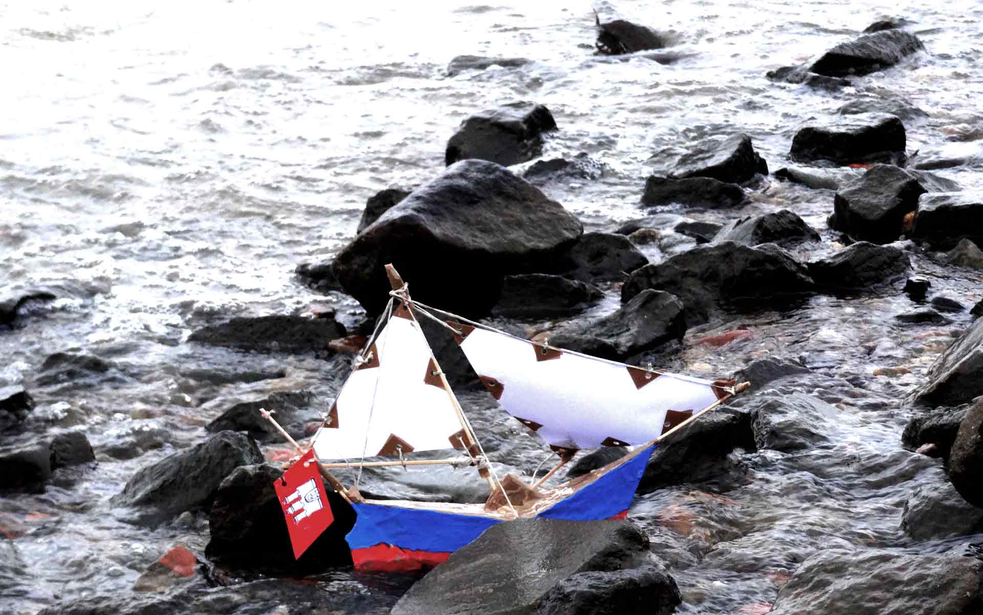 ... and running aground in the rough Tide.