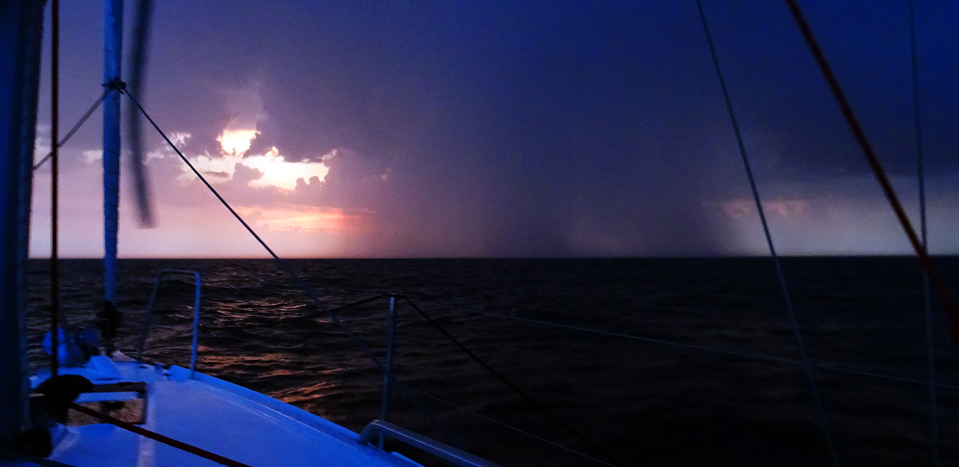 https://no-frills-sailing.com/wp-content/uploads/2019/07/14_thunderstorm-at-sea.jpg