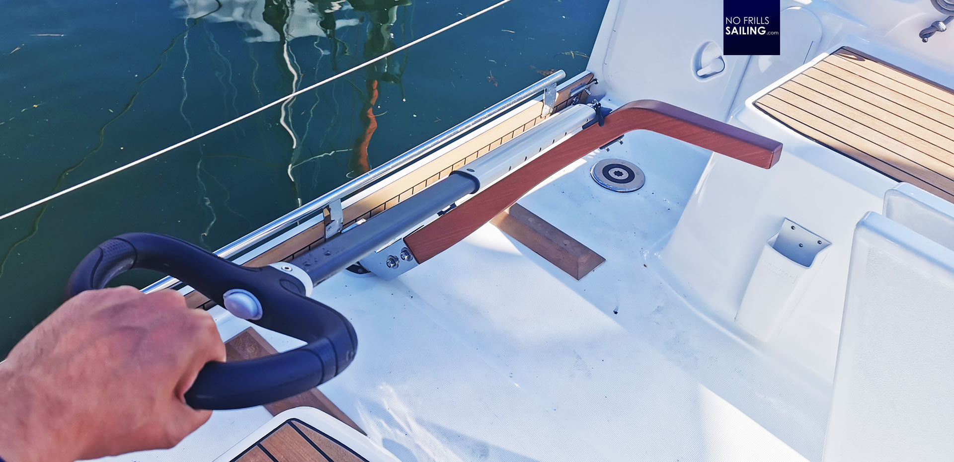 sailboat tiller vs wheel